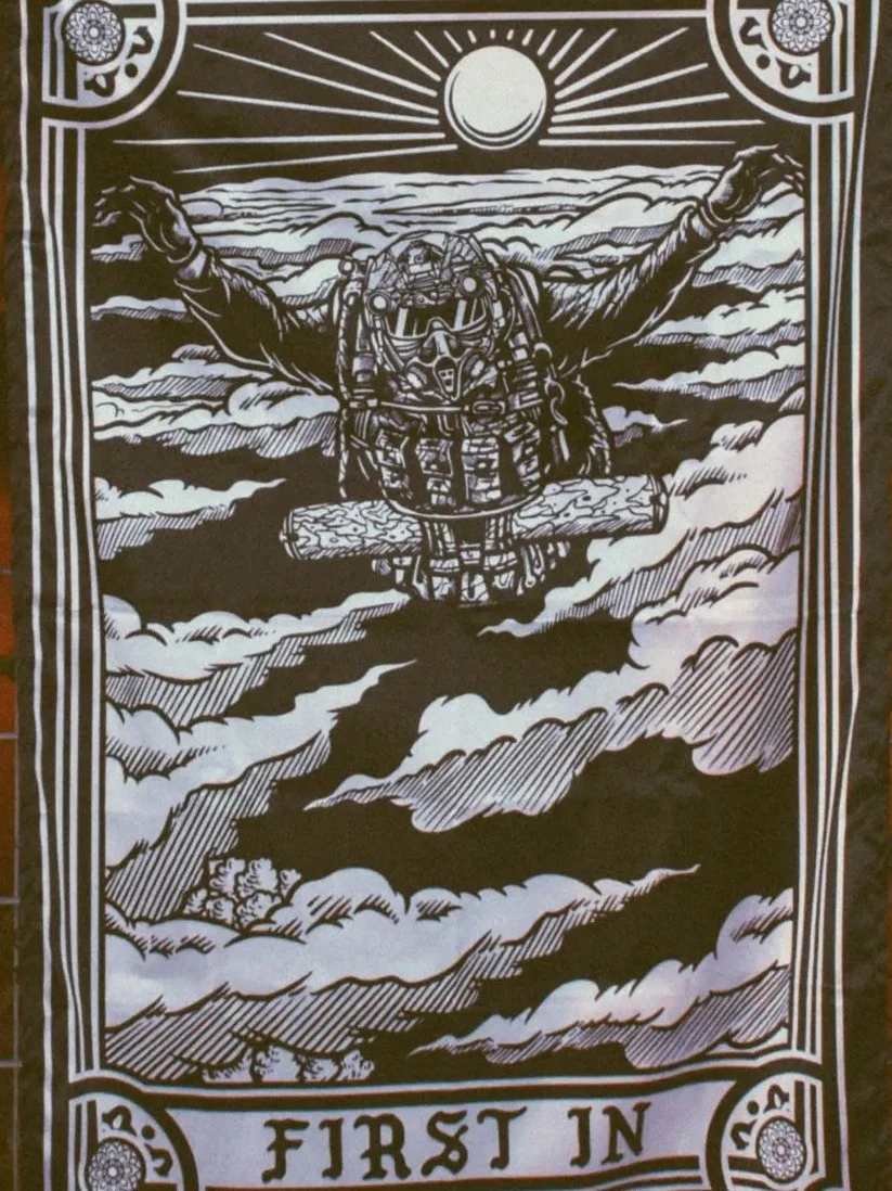 the trace apparel collection featuring a military free fall guy in mid air