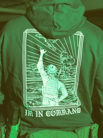 the trace apparel collection featuring a fst jtac guy standing in front of a firing plane