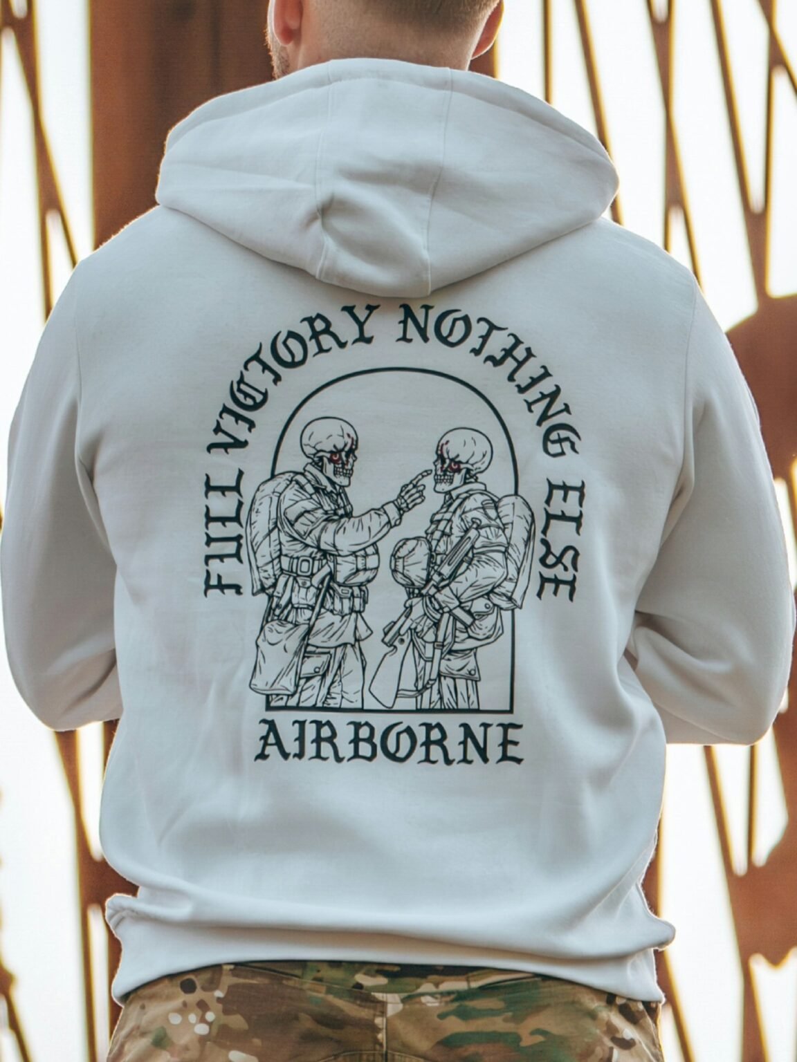 Hoodie featuring World War II design of two soldiers standing before a parachute jump