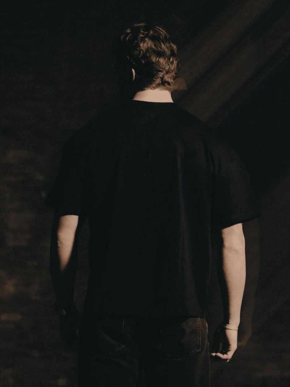 Black T-shirt from The Trace Premium collection with clean, minimalist design