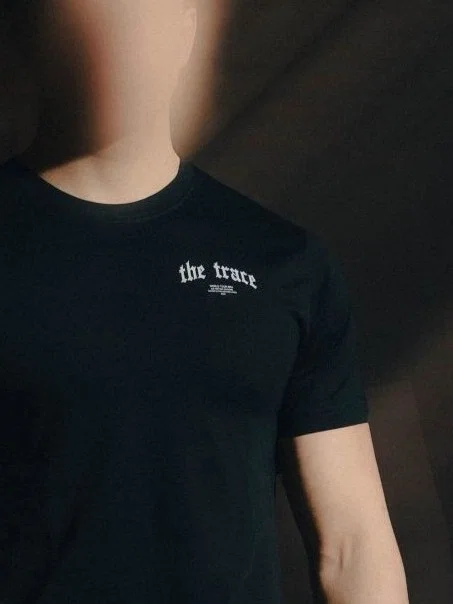 Black T-shirt from The Trace Premium collection with clean, minimalist design