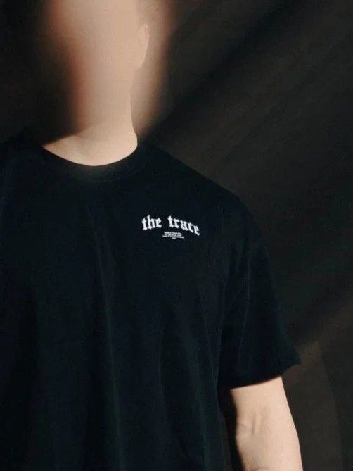 Black T-shirt from The Trace Premium collection with clean, minimalist design
