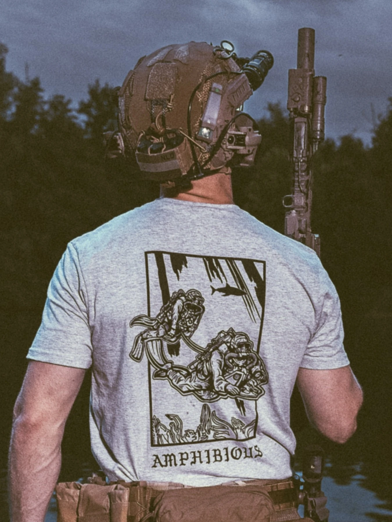 the trace apparel collection featuring two military reconnaissance divers swimming underwater