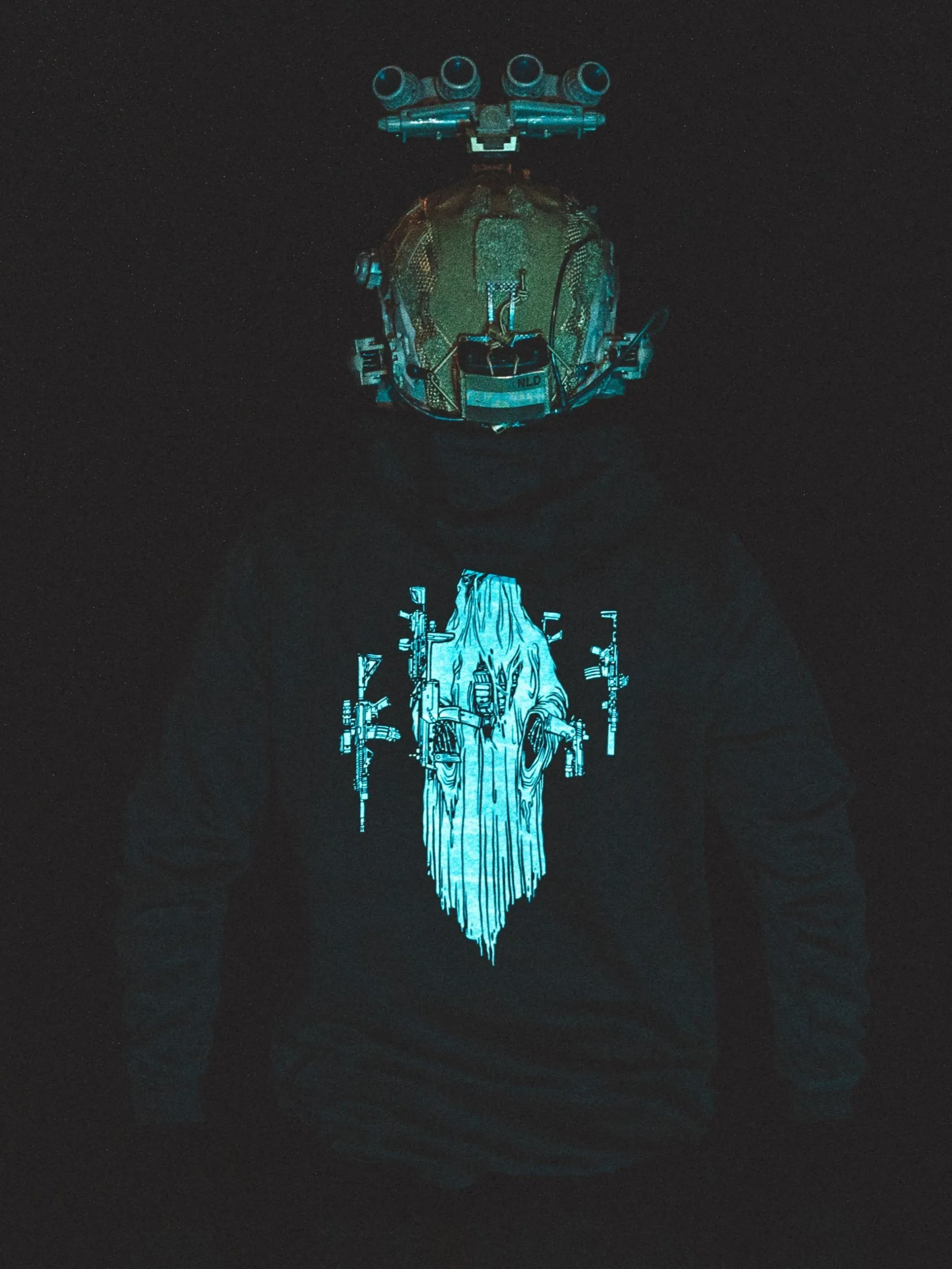 the trace halloween collection featuring a ghost with hovering weapons around him