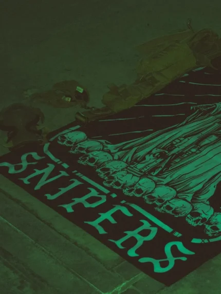 Combat flag displaying a sniper skeleton atop skulls, gripping an Arctic Warfare Super Magnum in a bold, battlefield stance.
