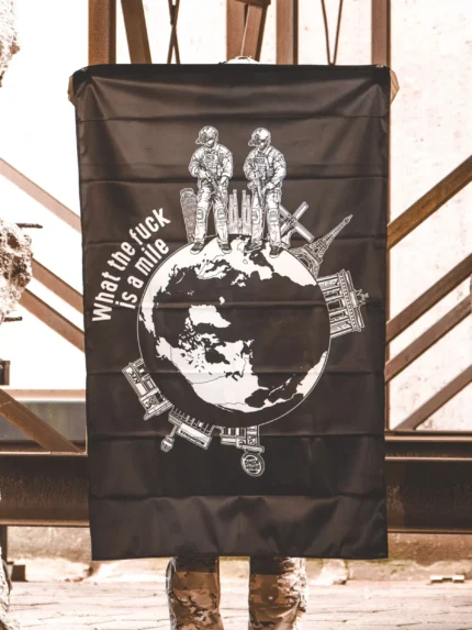 the trace apparel collection featuring 2 operators standing on europe and watching america saying wtf is a mile