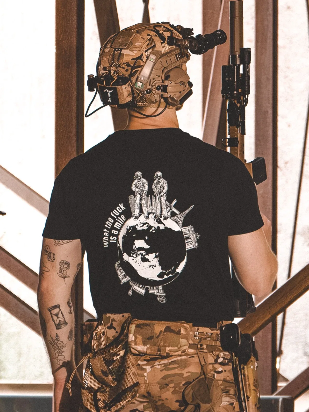 the trace apparel collection featuring 2 operators standing on europe and watching america saying wtf is a mile