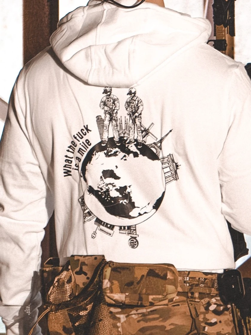the trace apparel collection featuring 2 operators standing on europe and watching america saying wtf is a mile