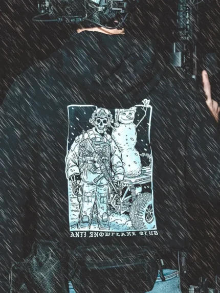 the trace apparel collection featuring a design with a military operator standing next to a snowman with a text saying anti snow flake club