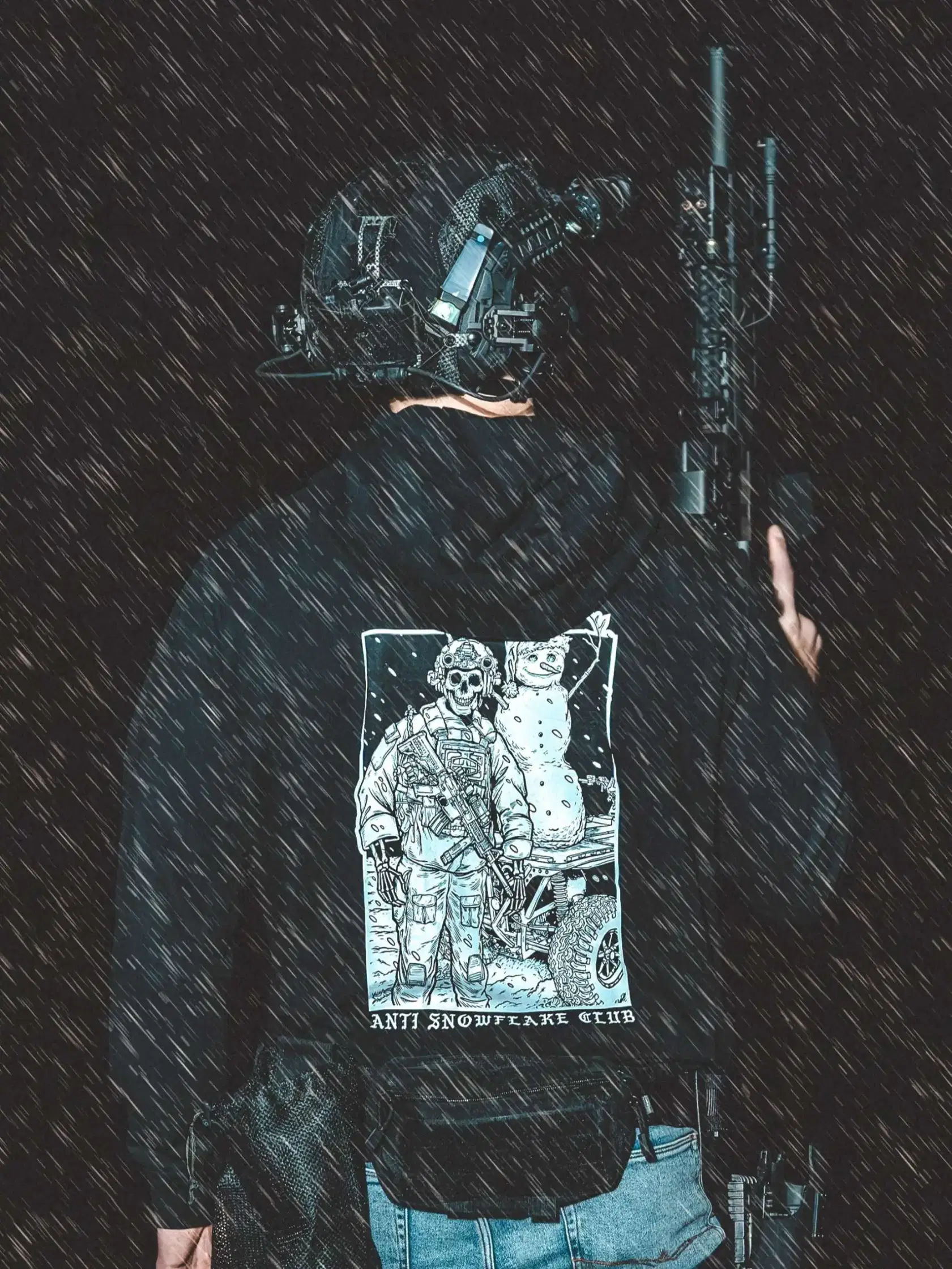 the trace apparel collection featuring a design with a military operator standing next to a snowman with a text saying anti snow flake club