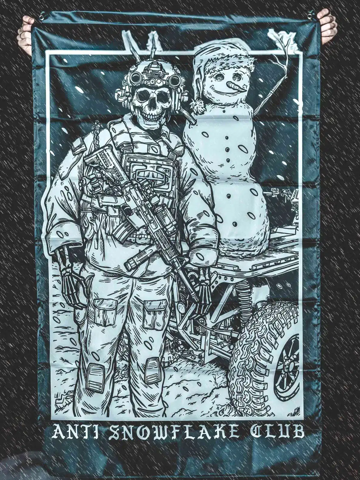 the trace apparel collection featuring a design with a military operator standing next to a snowman with a text saying anti snow flake club