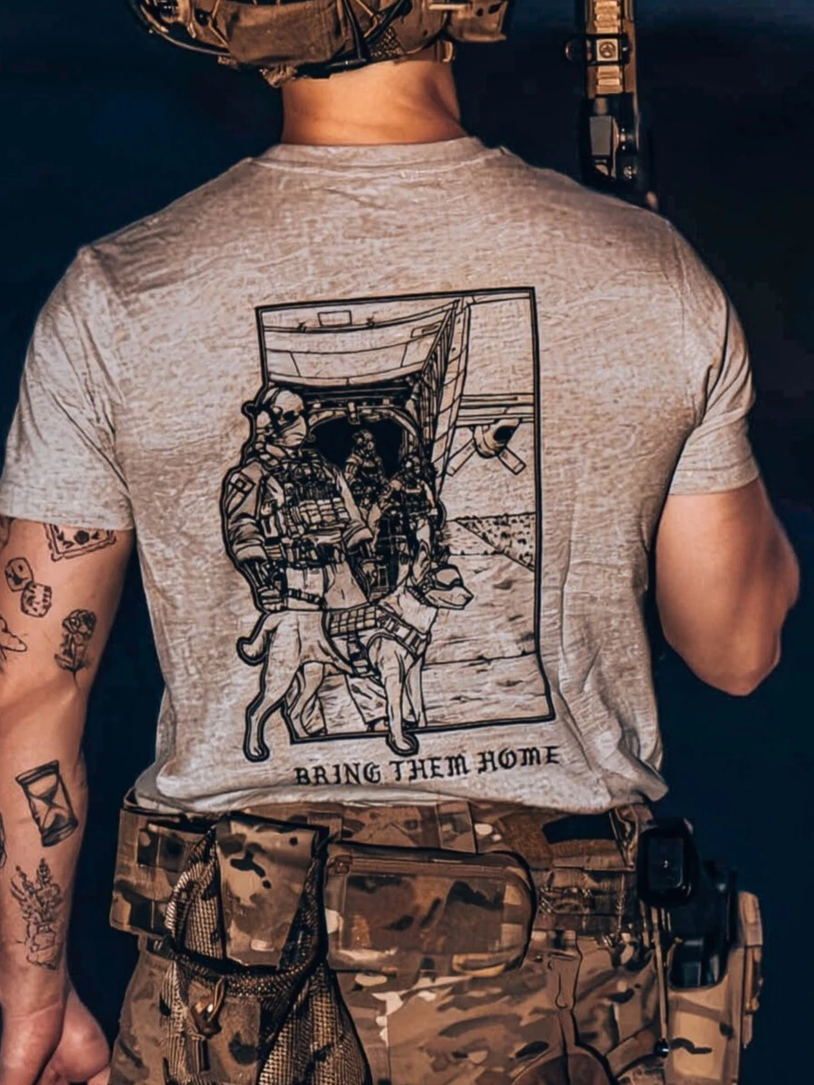 grey tshirt from The Trace featuring k9 and his doghandler on a rescue mission by c130.