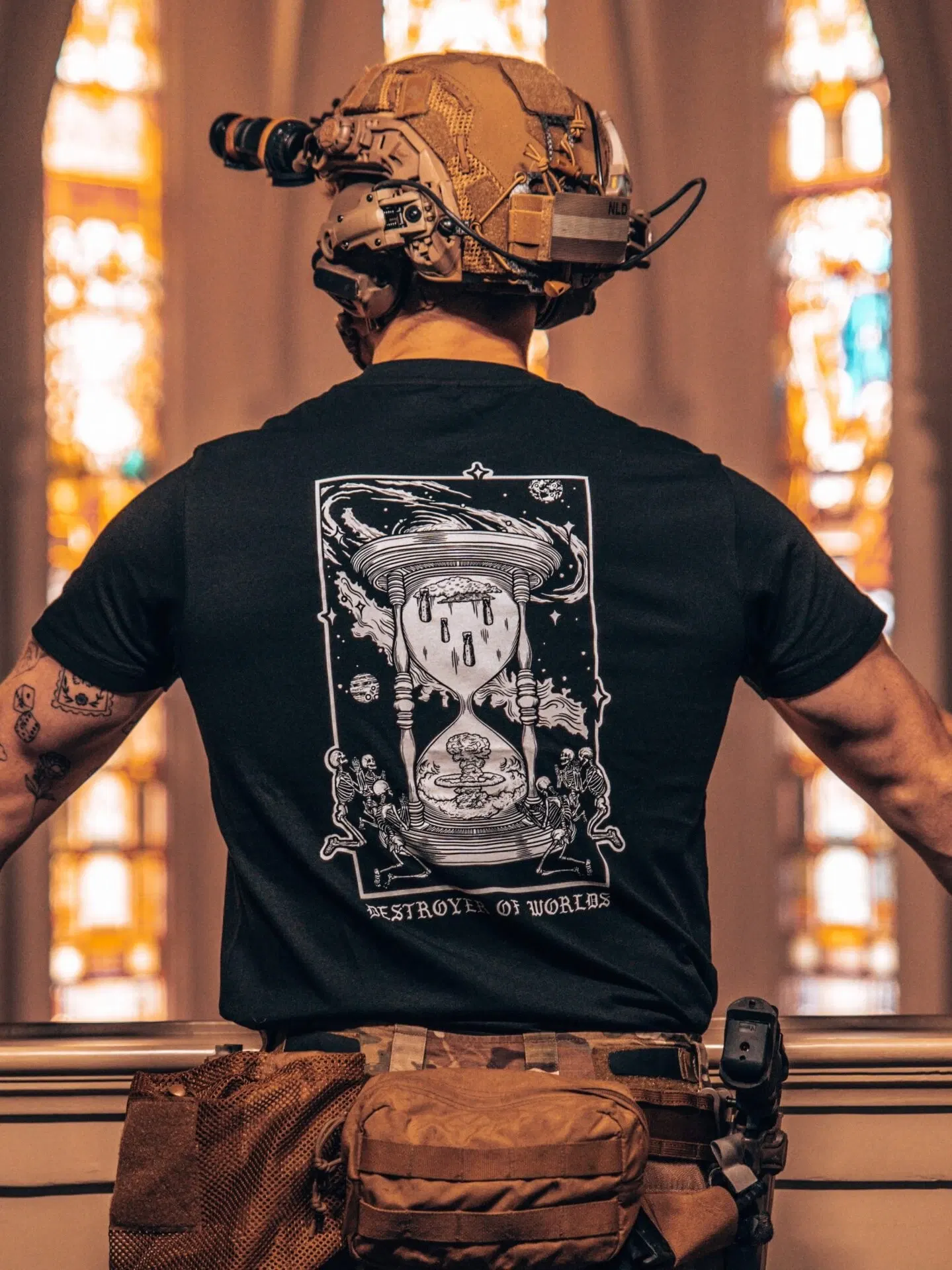 the trace apparel collection featuring skeletons praying to an hourglass showing atomic weapons dropping