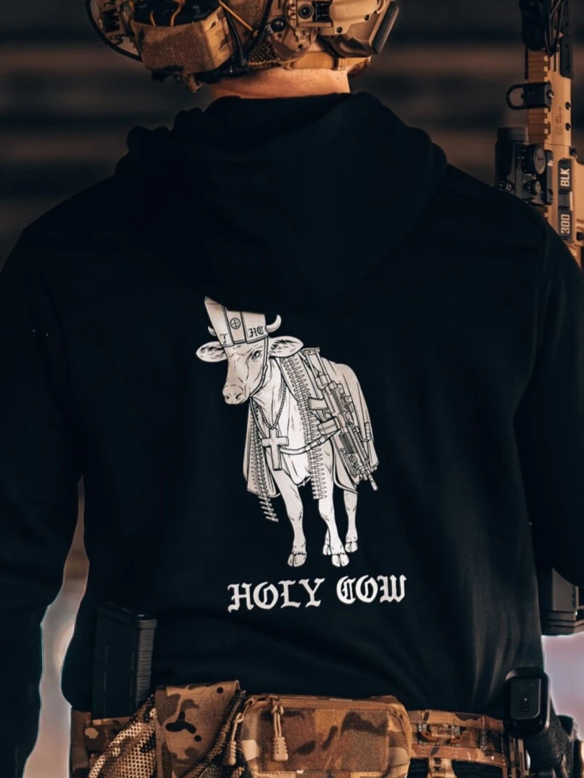the trace apparel collection featuring a holy cow armed with weapons