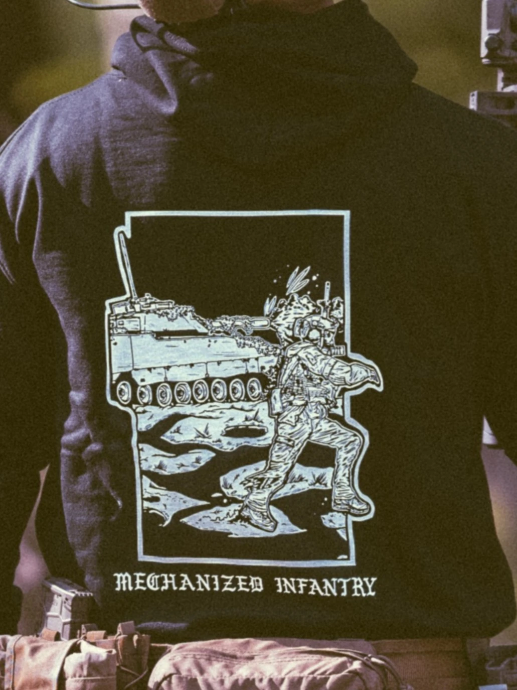 the trace apparel collection featuring guys fighting alongside a military cv90 vehicle