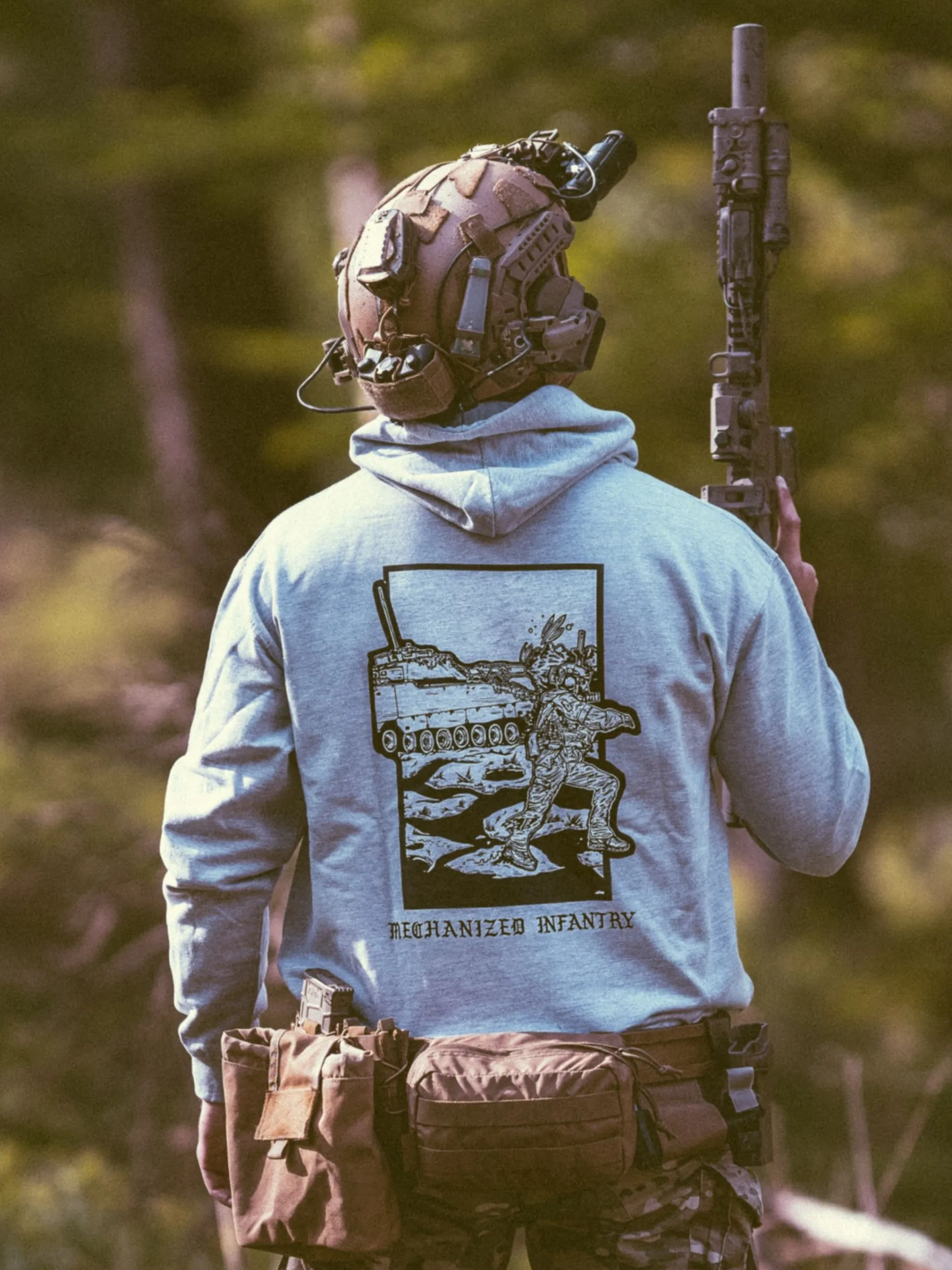 the trace apparel collection featuring guys fighting alongside a military cv90 vehicle