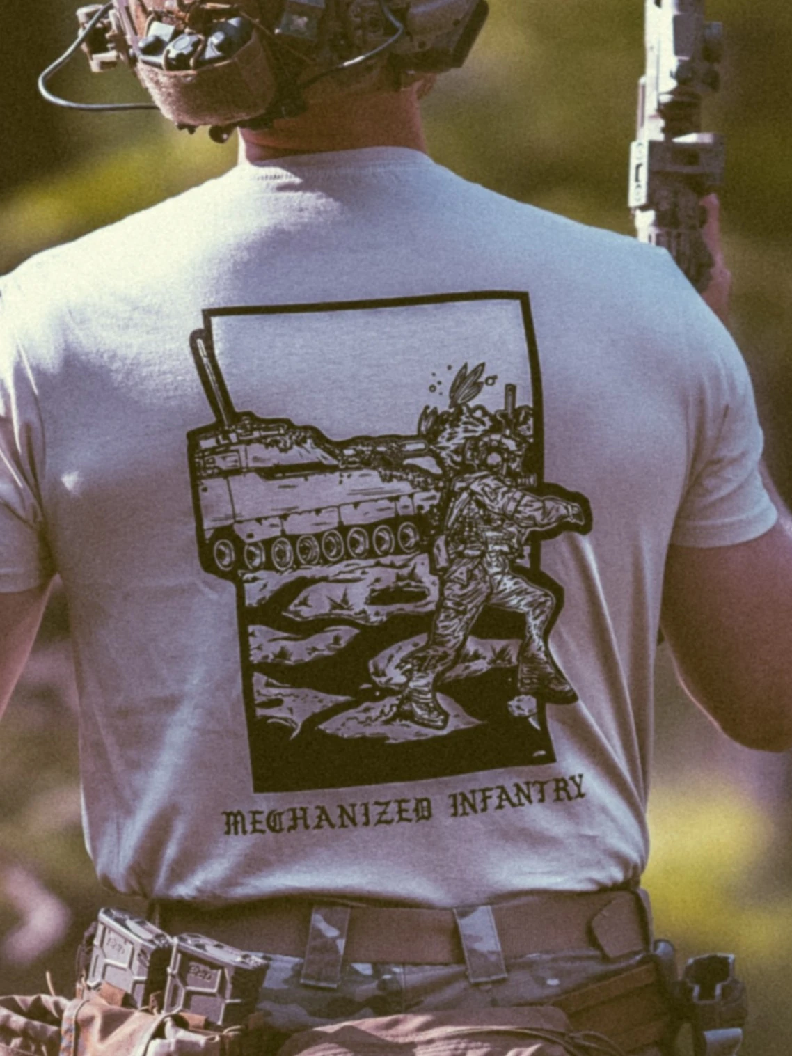the trace apparel collection featuring guys fighting alongside a military cv90 vehicle