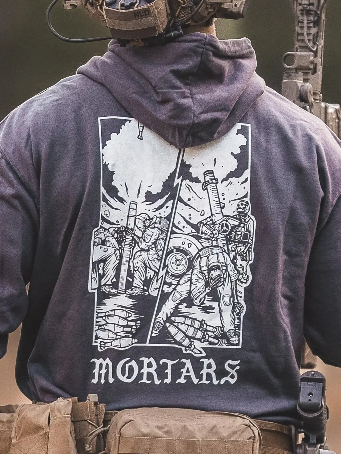 the trace apparel collection featuring guys firing a 81mm mortar and a 120mm mortar