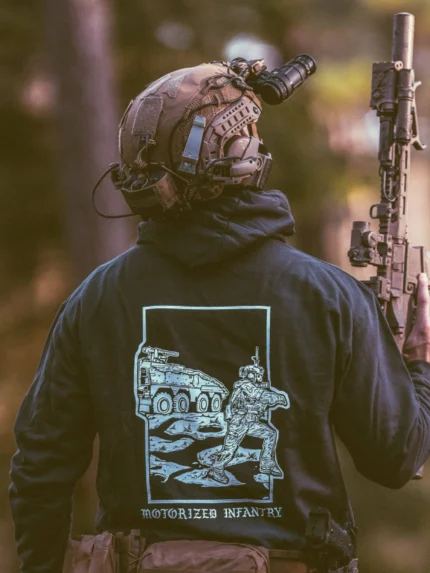 the trace apparel collection featuring guys fighting alongside a military boxer vehicle