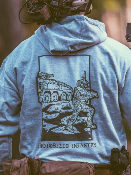 the trace apparel collection featuring guys fighting alongside a military boxer vehicle