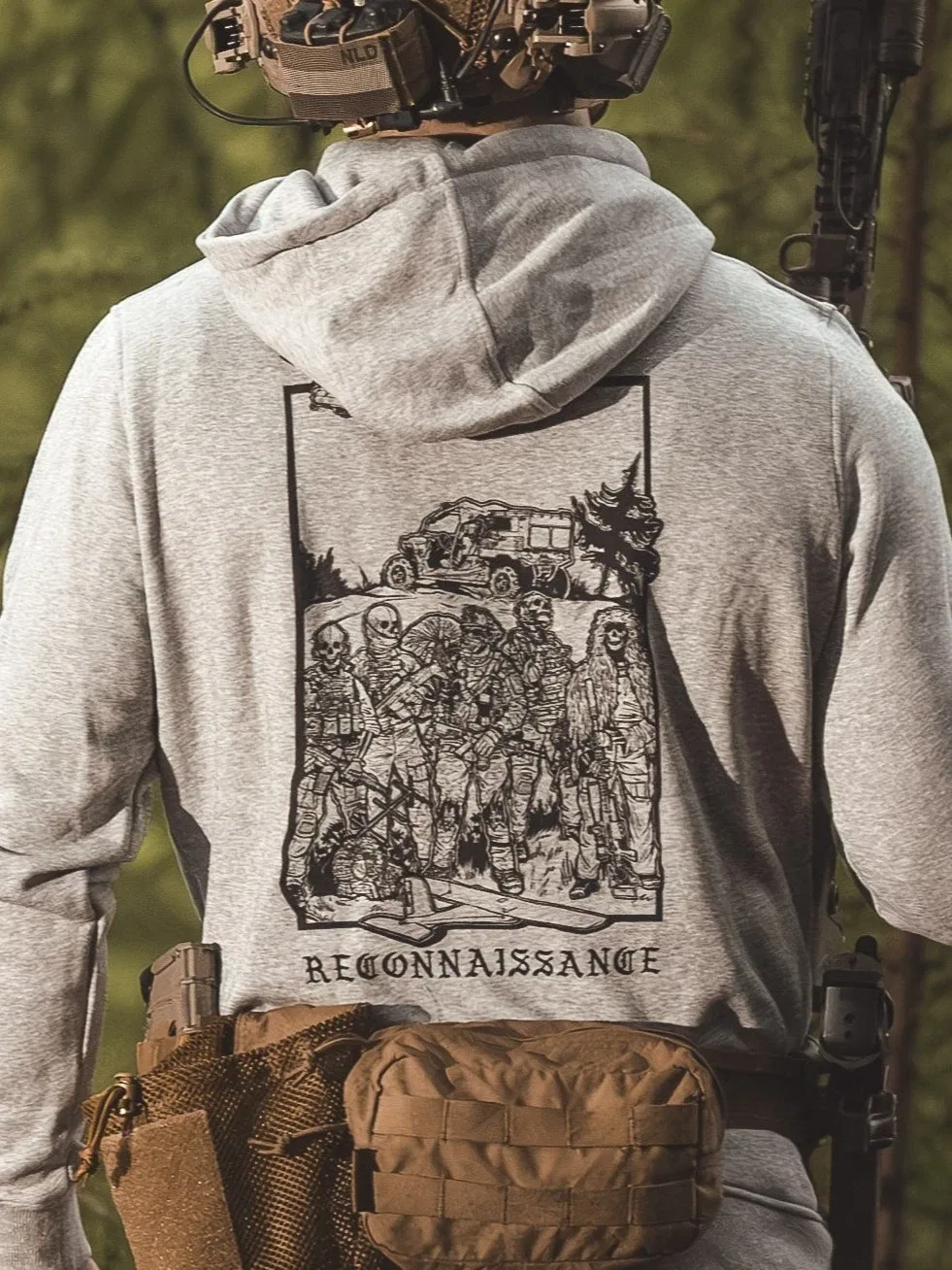 the trace apparel collection featuring a military reconnaissance group standing next to their equipment