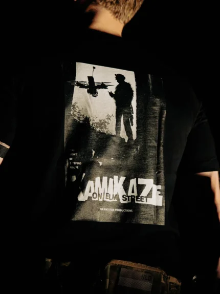 Close-up of the Kamikaze on Elm Street back print on the black The Trace T-shirt