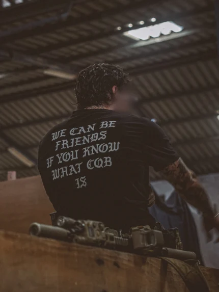 the trace shirt with a text saying we can be friends if you know what cqb is